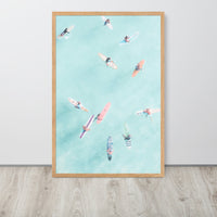 Surfers Floating in Ocean Beach Framed Art Print